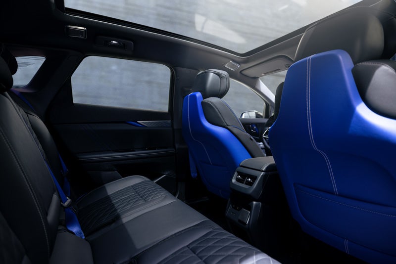 Back Seat View of the 2026 OPTIQ-V Blue Front Seats, Sun Roof, and Interior | Peterson Cadillac in BOISE ID